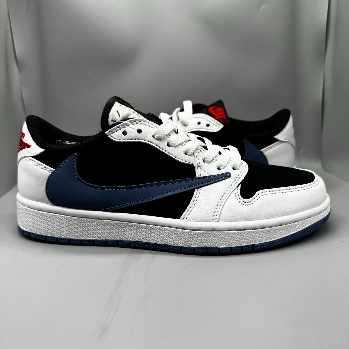 Travis Scott x Air Jordan 1 Retro Low OG SP 'Lightning' - White / Black / Blue