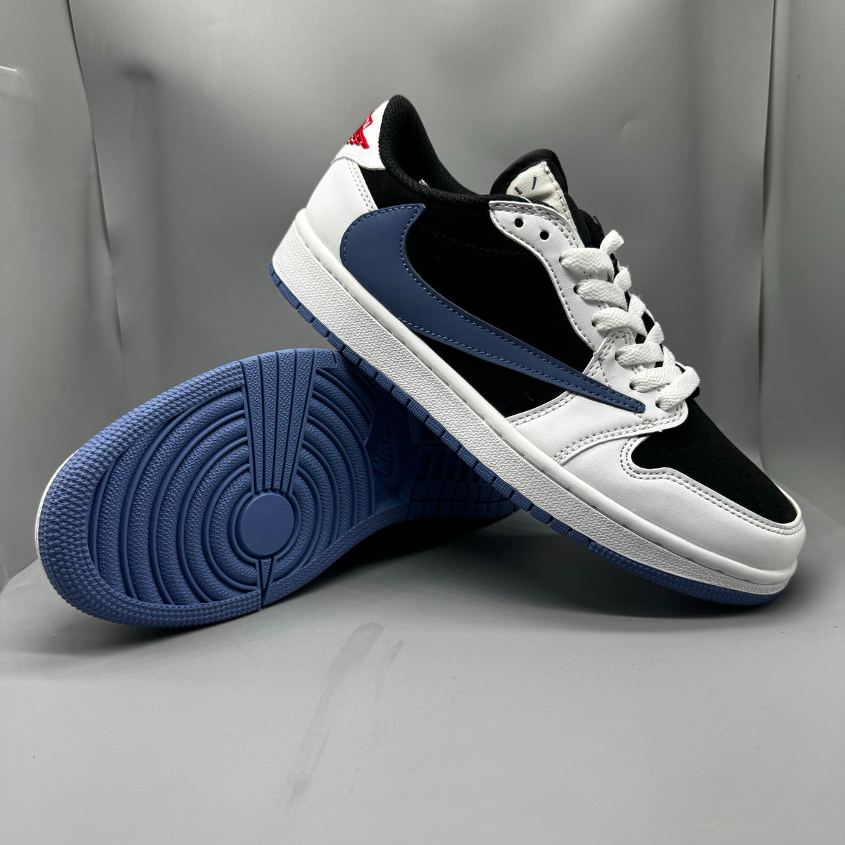 Travis Scott x Air Jordan 1 Retro Low OG SP 'Lightning' - White / Black / Blue