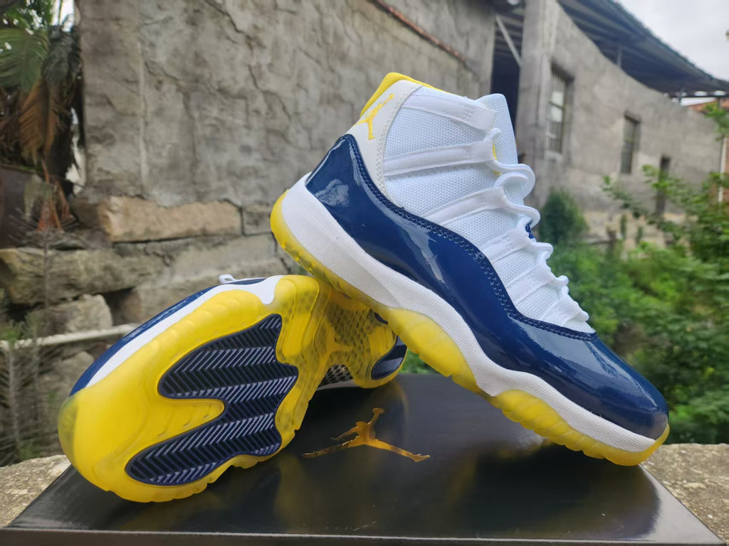 Air Jordan 11 - White / Blue / Yellow