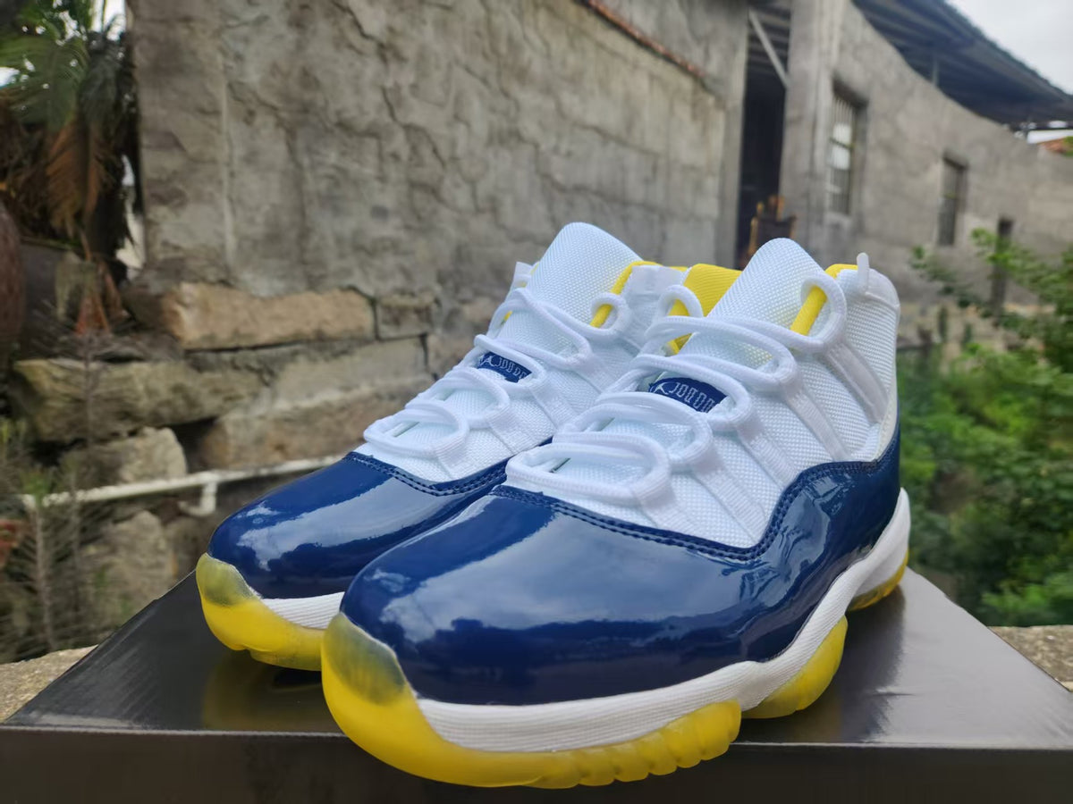 Air Jordan 11 - White / Blue / Yellow