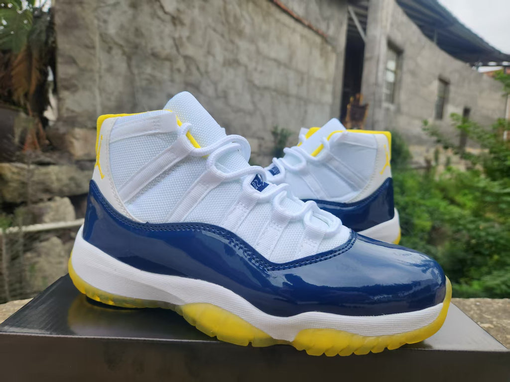 Air Jordan 11 - White / Blue / Yellow